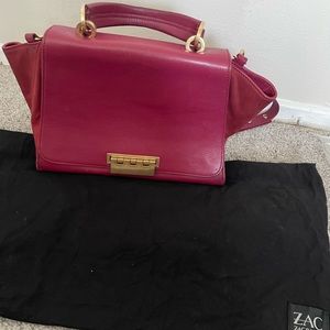 Zac Posen Red shoulder bag with straps.
